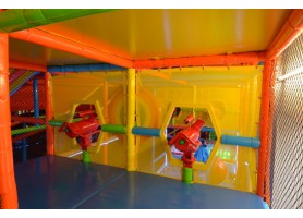 Kids play at Indoors playground equipment Kids play at Indoors playground equipment