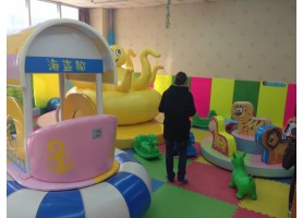 Kids play with friend in Indoors playground Kids play with friend in Indoors playground